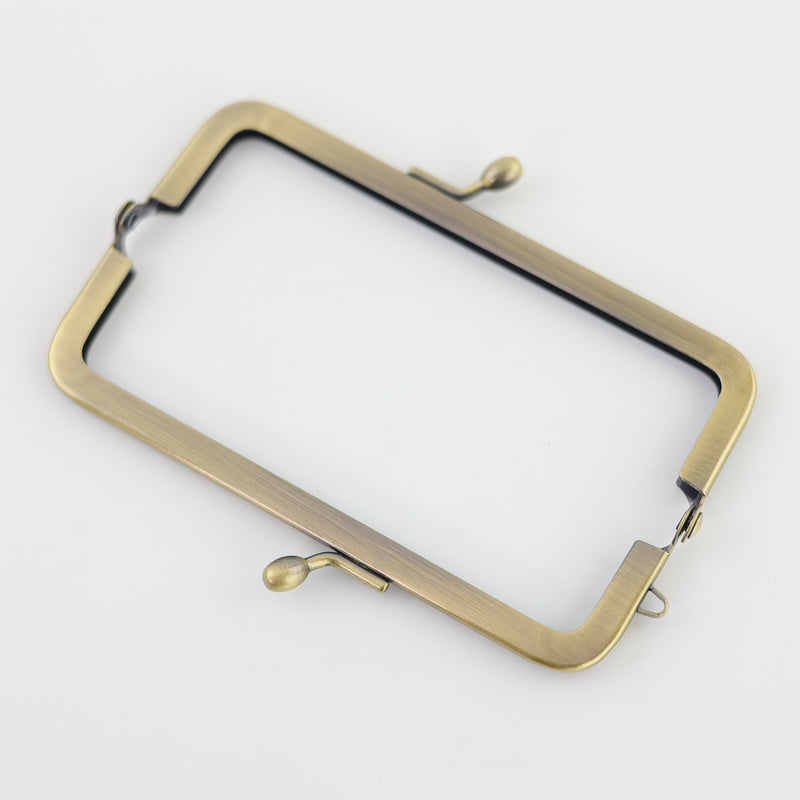4 5/8 x 1 1/2 inch - Antique Brass Metal Purse Frame | SUPPLY4BAG
