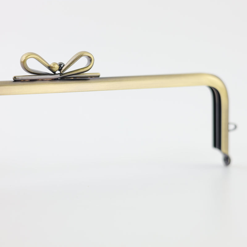 7 1/4 x 2 inch - Bow Knot Kisslock Antique Brass Metal Purse Frame