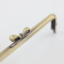 7 1/4 x 2 inch - Bow Knot Kisslock Antique Brass Metal Purse Frame
